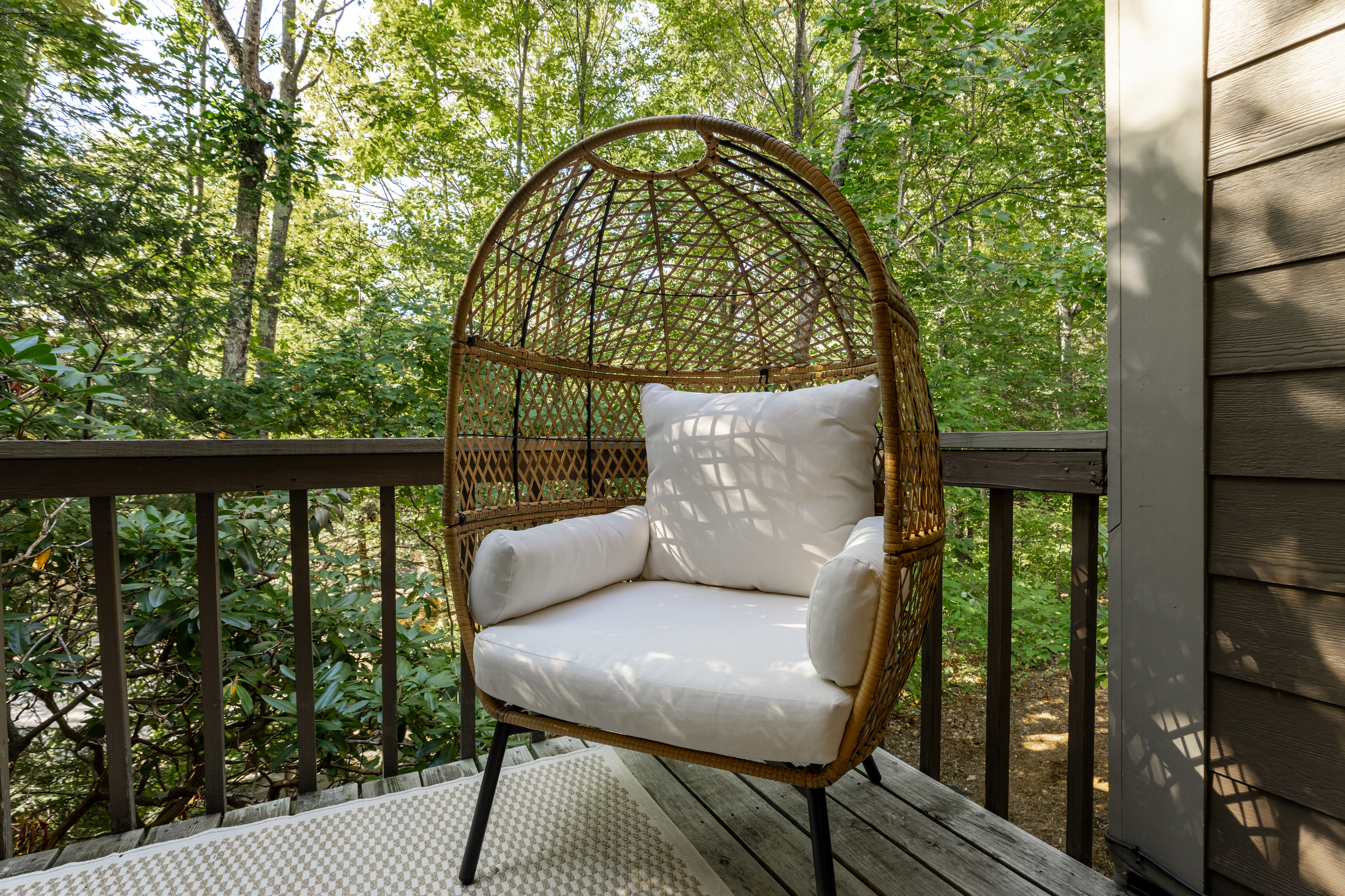 Outdoor chair on the deck at The Retreat at Three Ridges, Wintergreen VA