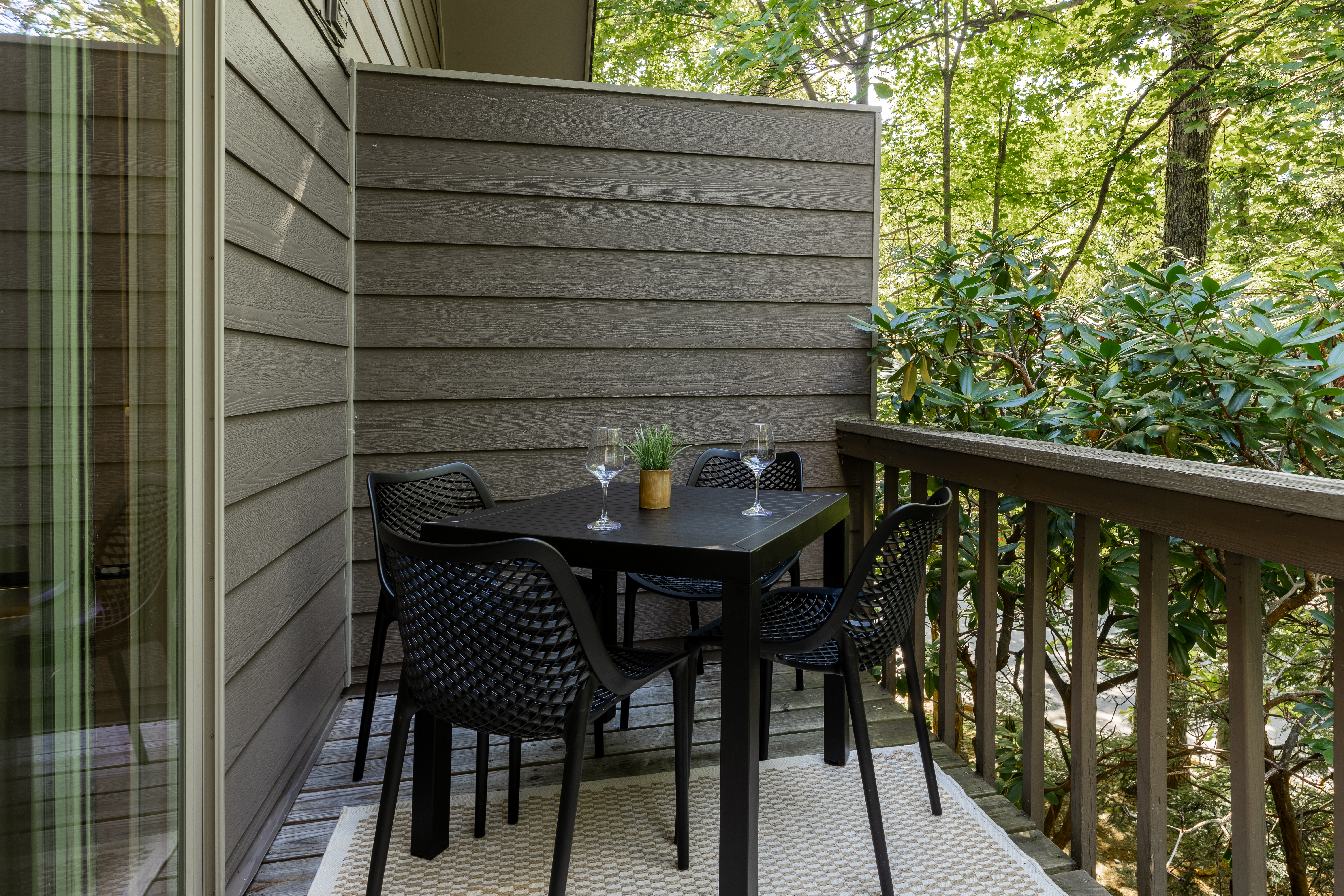 Patio table on balcony at The Retreat at Three Ridges, Wintergreen VA