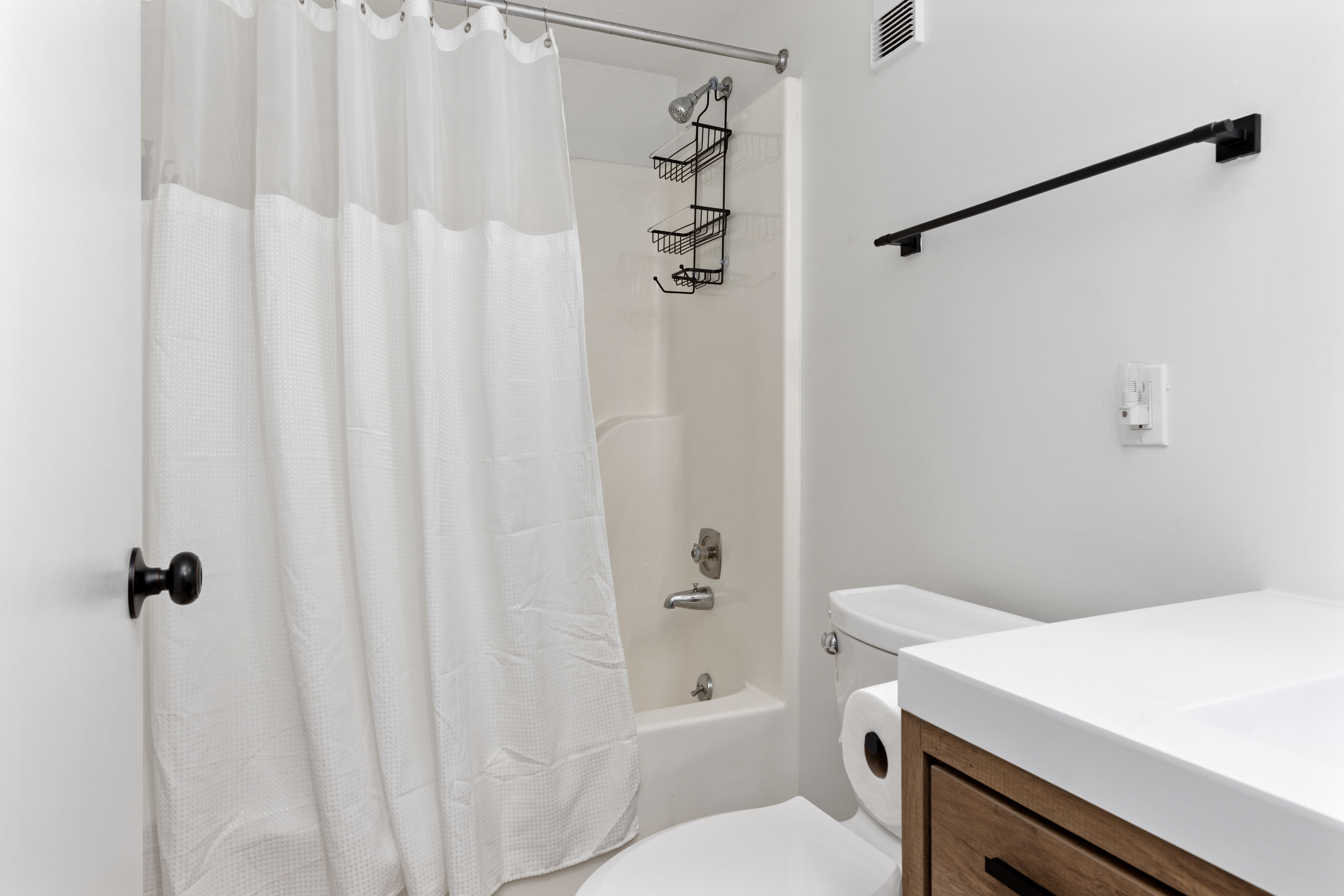 Bathroom with tub and vanity at The Retreat at Three Ridges, Wintergreen VA